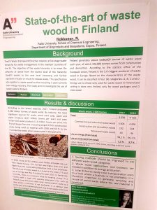 Poster with headline "State of the art for waste wood in Finland". Photo. 