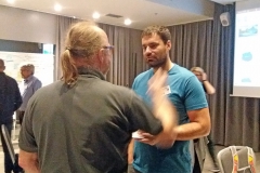 Two men talking. Photo.