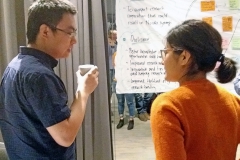 Man and a woman talking. Photo.